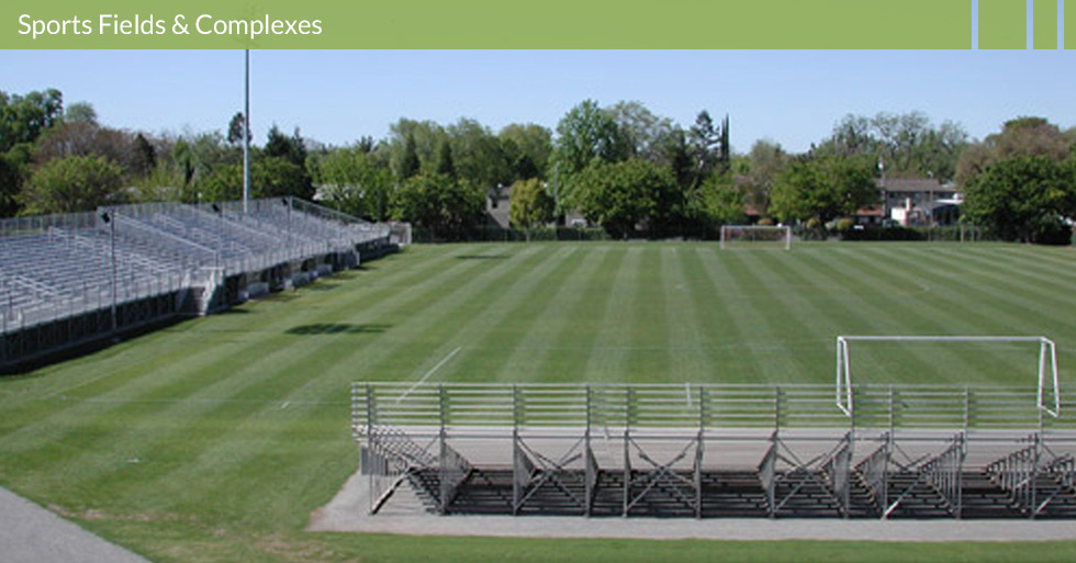 Melton Design Group, a landscape architecture firm, designed the Chico State Soccer Complex in Chico, CA. This large field is bordered by wood and chain link fences completed with plenty of seating in the bleachers for fans!