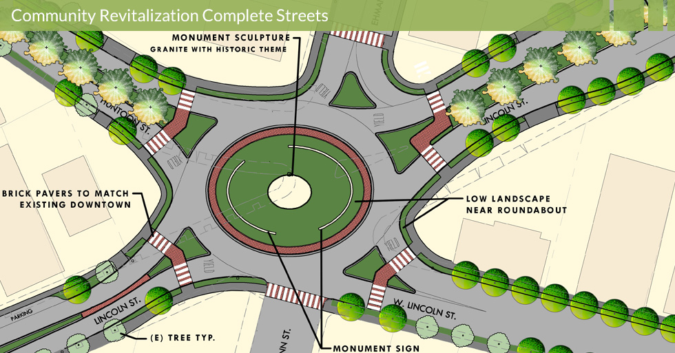 Melton Design Group, a landscape architecture and Five-way Roundabout at Lincoln Huntoon in Oroville, CA. Including a granite monument sculpture with a historic theme, brick pavers to match existing downtown, and low landscaping near the roundabout. 