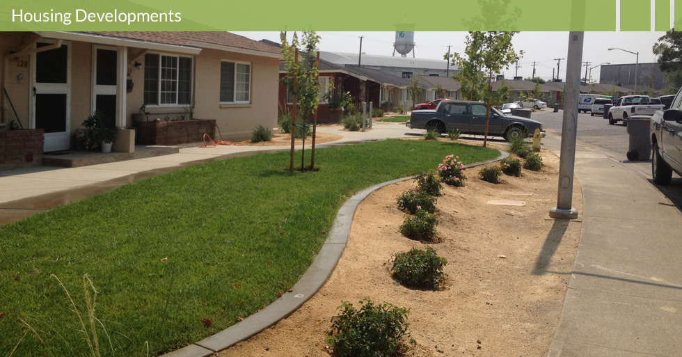 Melton Design Group, a landscape architecture firm, designed this Housing Authority of Butte County in Gridley, CA. This minimal turf landscape give the house a great splash of green complemented by organic gravel and bushes. 