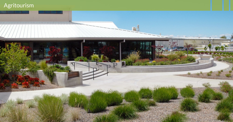 Melton Design Group designed Lundberg Farms in Richvale, CA. Their facility offers a sustainable design with a trough like water feature in their entry and sustainable plantings. This multi-use venue offers events along their natural surroundings with a modern, organic design.