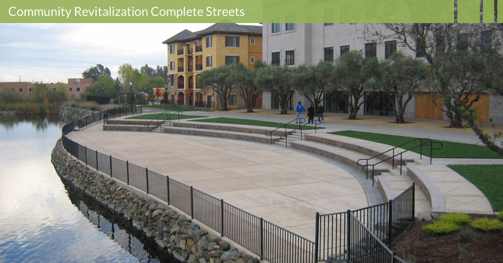Melton Design Group designed the revitalization of the Italian-inspired Towncenter Blvd. in El Dorado Hills, CA. Store-front enhancement, amphitheater, man-made lake, water features, walking trails, and olive tree lined streets.